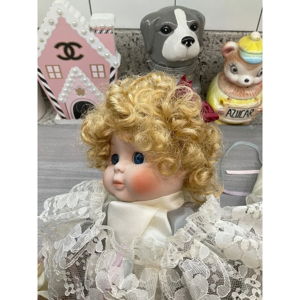 VINTAGE PORCELAIN DOLL IN CLOWN COSTUME